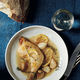 Martha Stewart’s roast chicken is made in a slow cooker with 20 cloves of garlic.